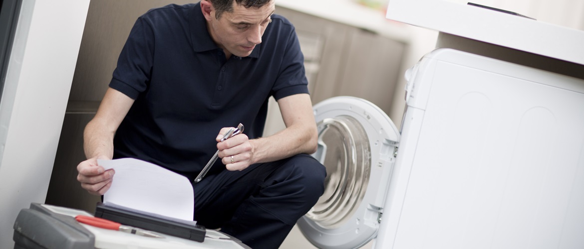 Man printing A4 document on PJ after fixing washing machine