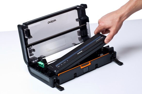 Man placing PJ in mobile carry case