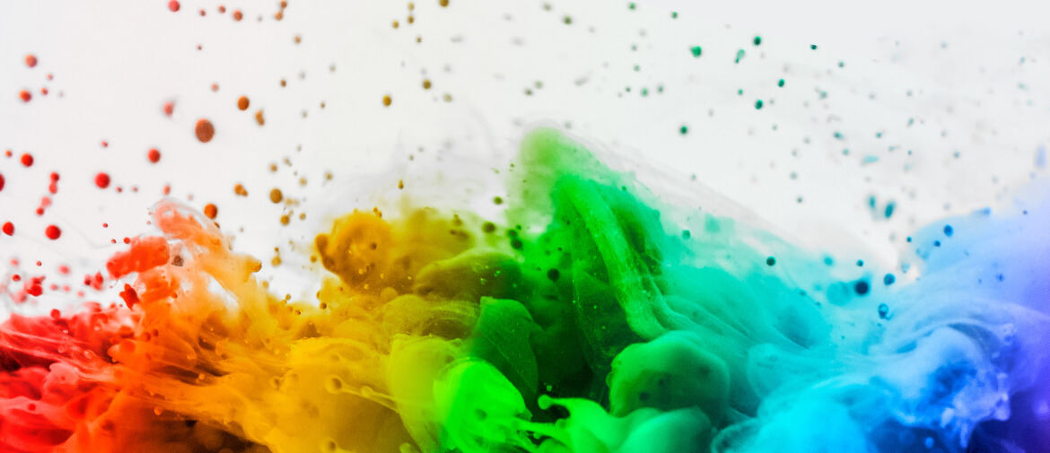clouhd of ink showing all colours of the spectrum